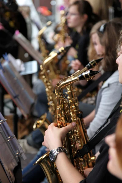Many saxophone player in the orchestra — Stock Photo, Image