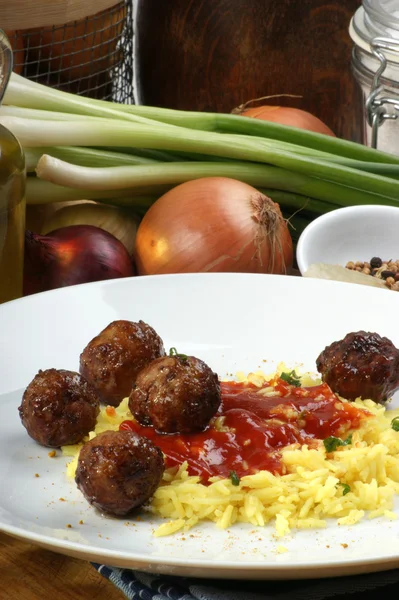 Meatballs with curry rice on a plate — Stock Photo, Image