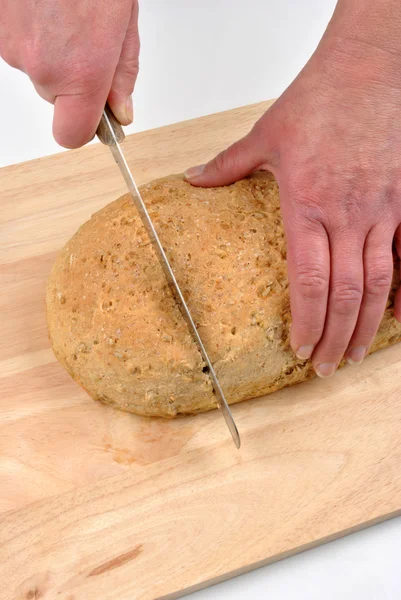 Cut organic bread at home — Stock Photo, Image