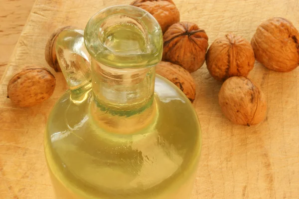 Walnut oil in a glass bottle — Stock Photo, Image