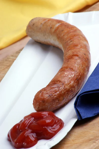 Ham sausage with ketchup — Stock Photo, Image