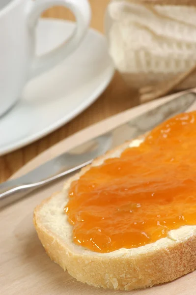 Bread with orange jam — Stock Photo, Image