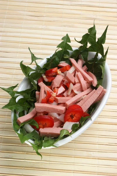 Sausage salad in a bowl — Stock Photo, Image