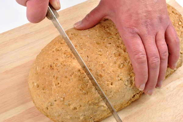 Cut organic bread at home — Stock Photo, Image