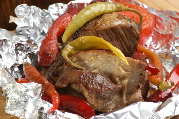 stock image Braised meat in tinfoil