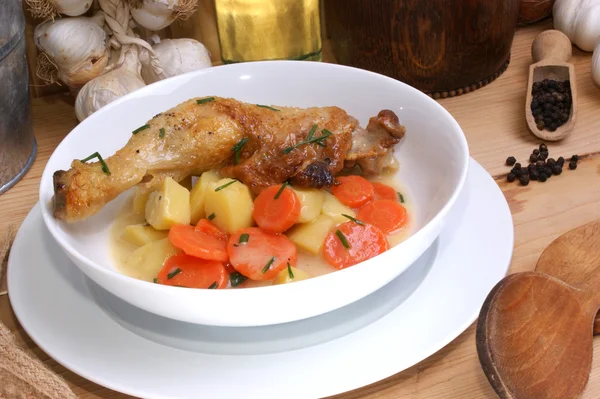 Potato soup with organic chicken leg — Stock Photo, Image