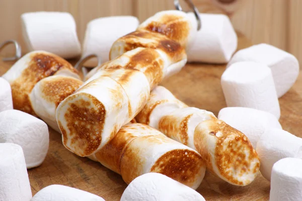 Grilled marshmallow on a skewer — Stock Photo, Image