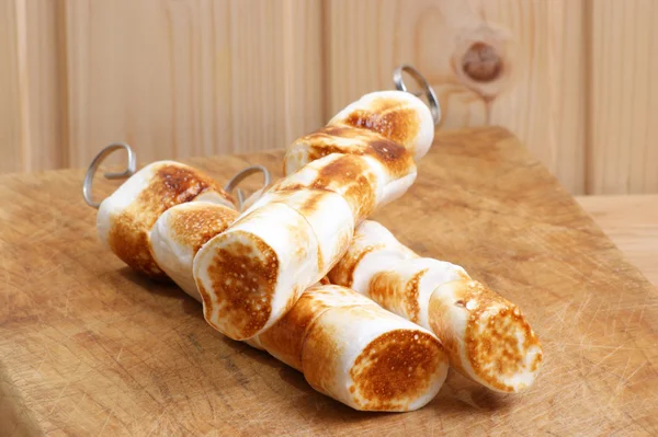Grilled marshmallow on a skewer — Stock Photo, Image