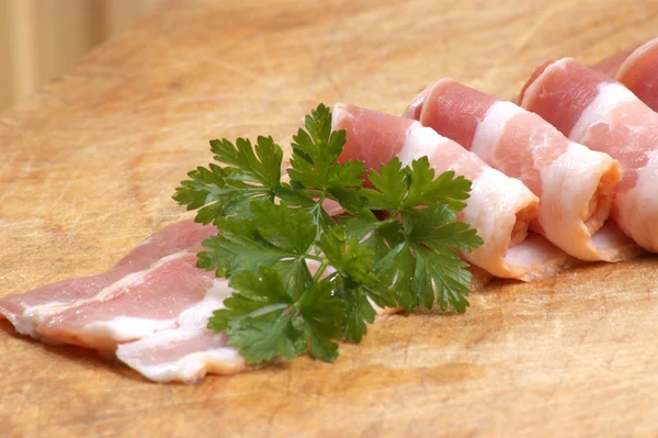 Rullade rå bacon — Stockfoto