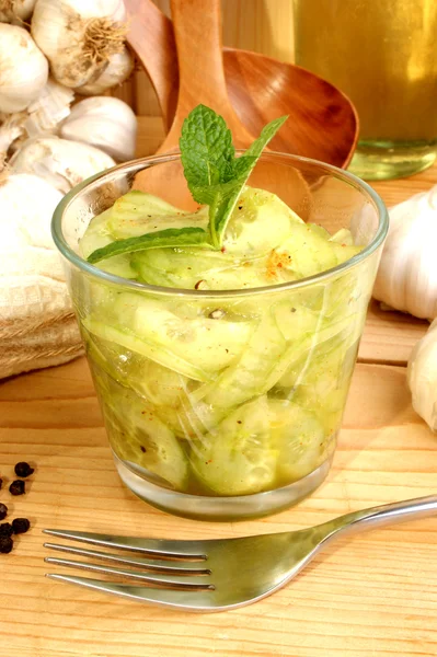 Organic cucumber salad in a glass bowl — Stock Photo, Image