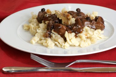 Spaetzle and organic deer goulash clipart