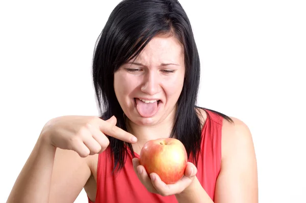 Eine junge Frau mag diesen Apfel nicht — Stockfoto