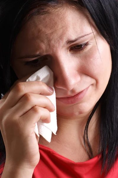Una giovane donna è triste e piange — Foto Stock