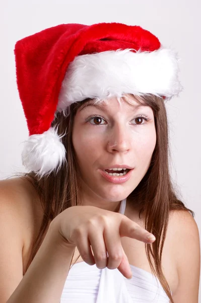 一个年轻女子携带圣诞帽子 — 图库照片