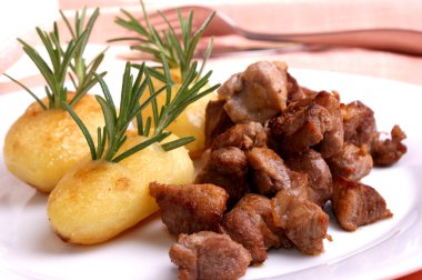 Some grilled goulash and organic herbed potato clipart