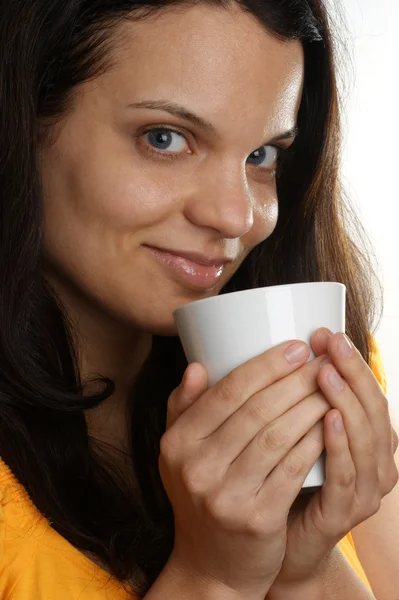 A young woman with brown hair and cup — Stock Photo, Image