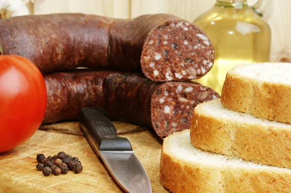 Some home made sausage and some toast bread — Stock Photo, Image