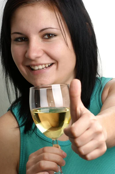 A young woman drinks home made wine — Stock Photo, Image