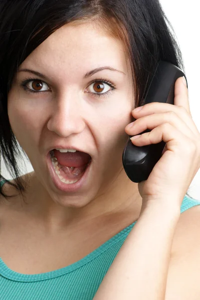 Jonge vrouw gaat op een telefoon — Stockfoto