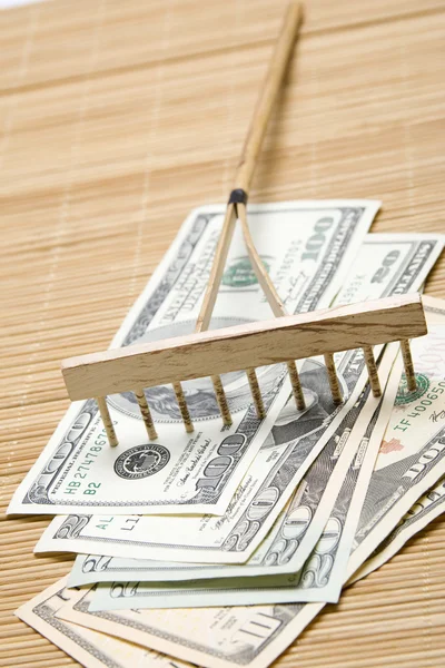 Raking In The Money — Stock Photo, Image