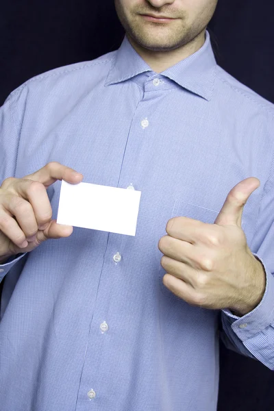 Uomo d'affari in possesso di carta bianca. Va bene. — Foto Stock