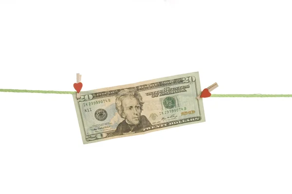 Dollar på en trä klädnypa — Stockfoto