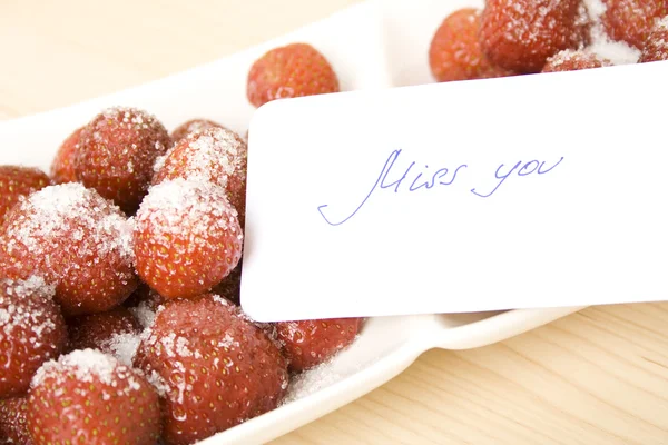 Strawberries with card miss you — Stock Photo, Image