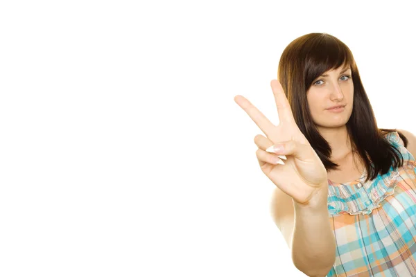 Smiling girl making victory gesture — Stock Photo, Image