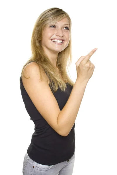 Młoda kobieta wskazująca — Zdjęcie stockowe