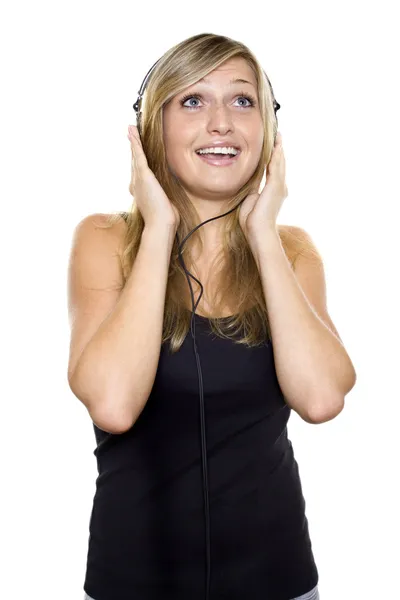 Kobieta słuchająca muzyki i śpiewająca — Zdjęcie stockowe