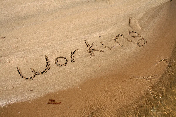 Tekst na piasku — Zdjęcie stockowe