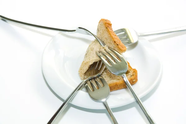 Vidličky a chléb — Stock fotografie
