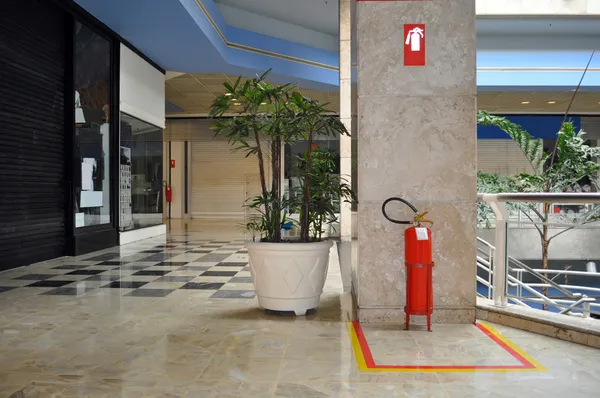 Shopping Mall and fire extinguisher — Stock Photo, Image