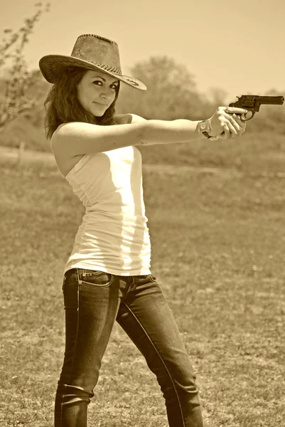 Dívka a pistole — Stock fotografie