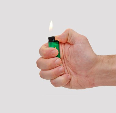 Hand with cigarette lighter isolated clipart