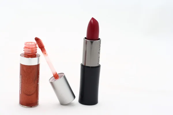 Glossy lipstick over white — Stock Photo, Image