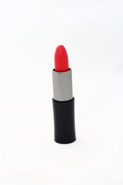 Red lipsticks in a black tube — Stock Photo, Image