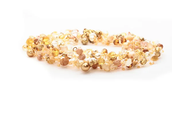 Golden nacklace on white background — Stock Photo, Image