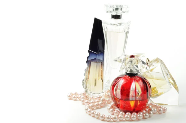 Perfumes and jewelry — Stock Photo, Image