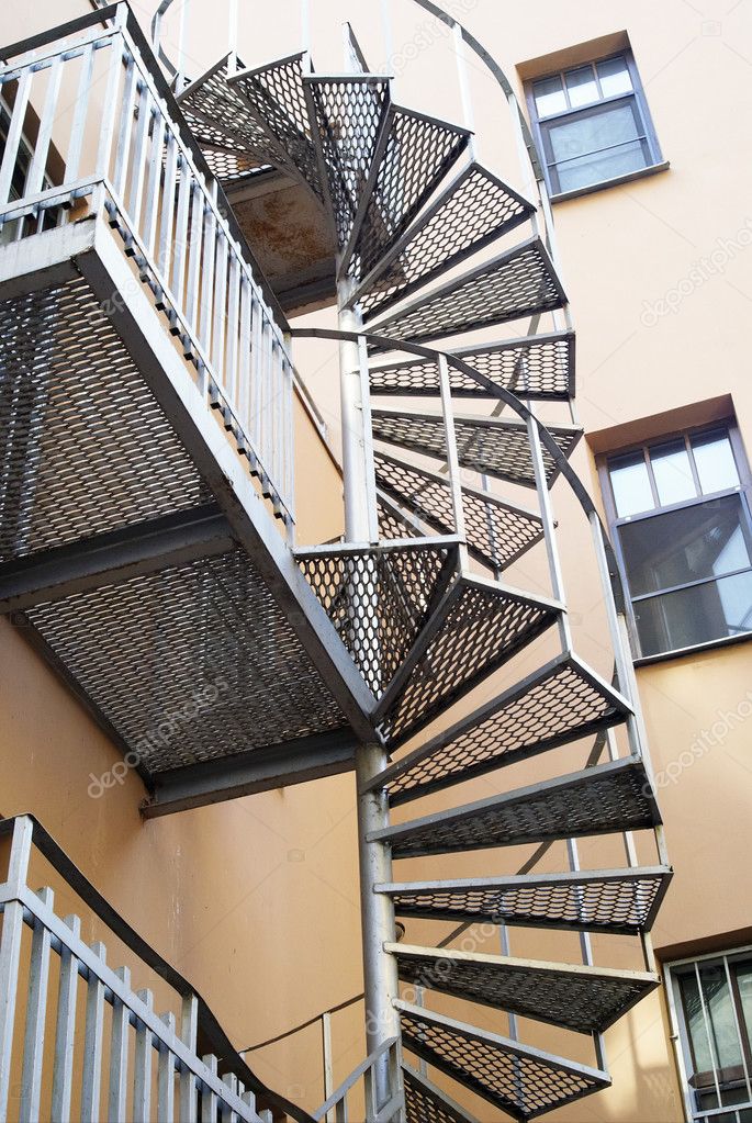 Spiral staircase and balconies.