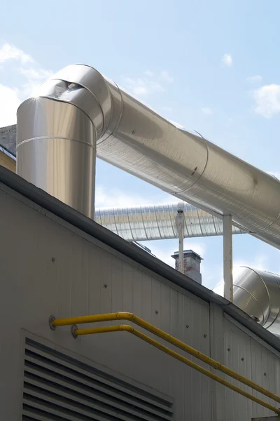 stock image Pipes of extraction on a background sky