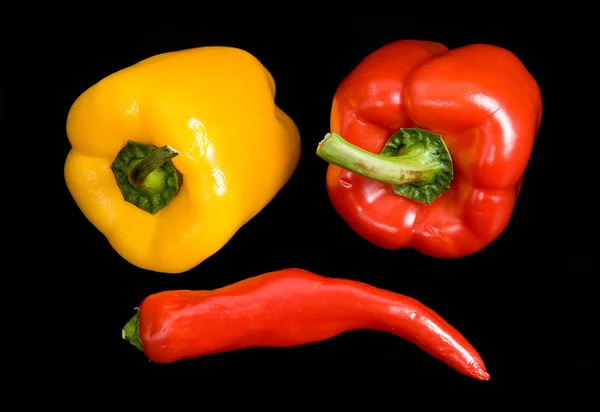 Pepper on a black background — Stock Photo, Image