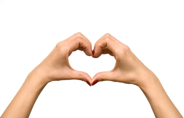 Heart shape formed with woman's hands — Stock Photo, Image