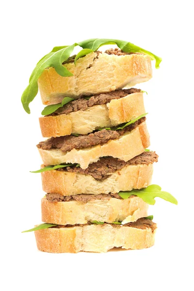 塔的三明治: 颈部和芝麻菜叶子 — 图库照片