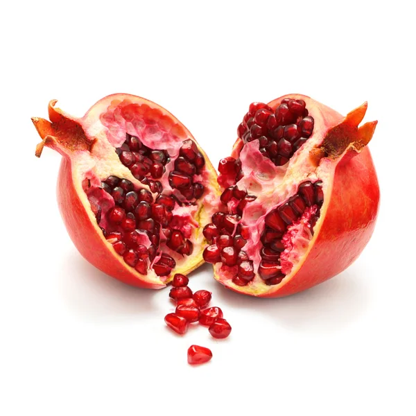 Broken pomegranate fruit on white background — Stock Photo, Image