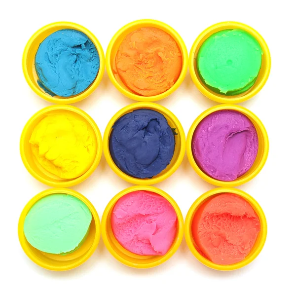 Containers with colorful plasticine — Stock Photo, Image