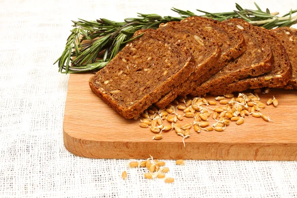 Pão, alecrim e gérmen de trigo — Fotografia de Stock