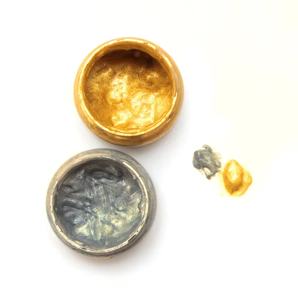 Tarro con pintura de oro y plata — Foto de Stock