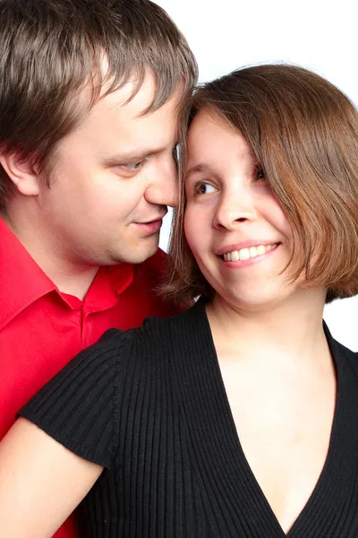 Retrato de perto de um jovem casal feliz olhando um para o outro — Fotografia de Stock
