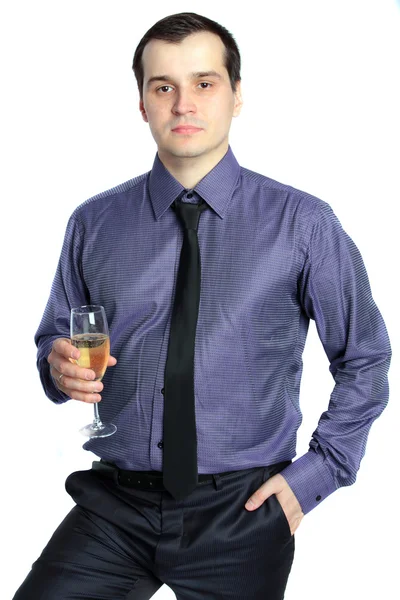 Confident business man holding a glass of champagne isolated on — Stock Photo, Image